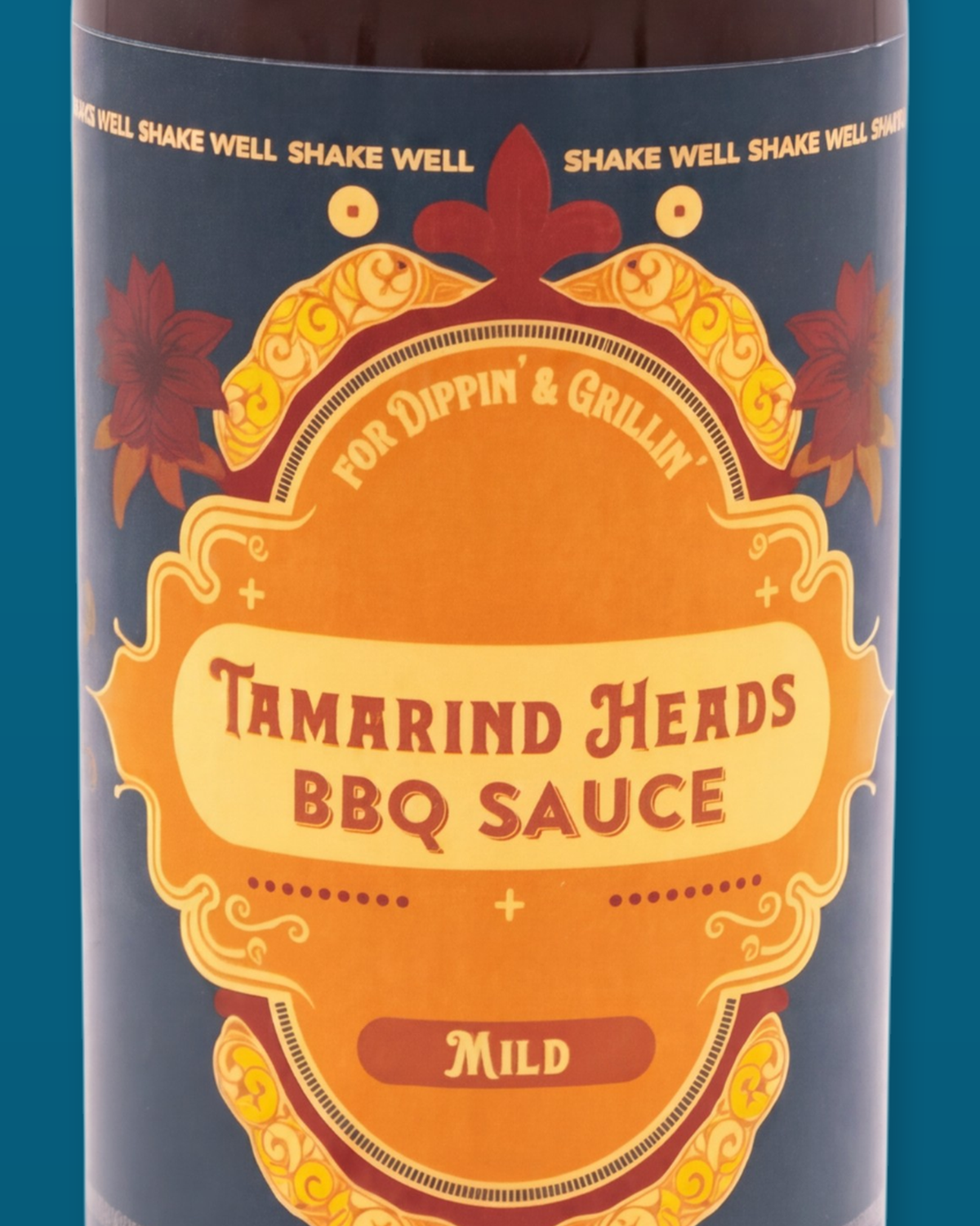 Detail of the Tamarind Heads Spiced Honey Mild BBQ sauce label artwork