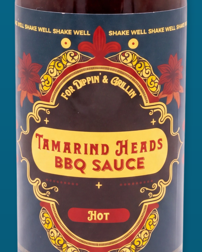 Detail of the Tamarind Heads Hot BBQ sauce label artwork