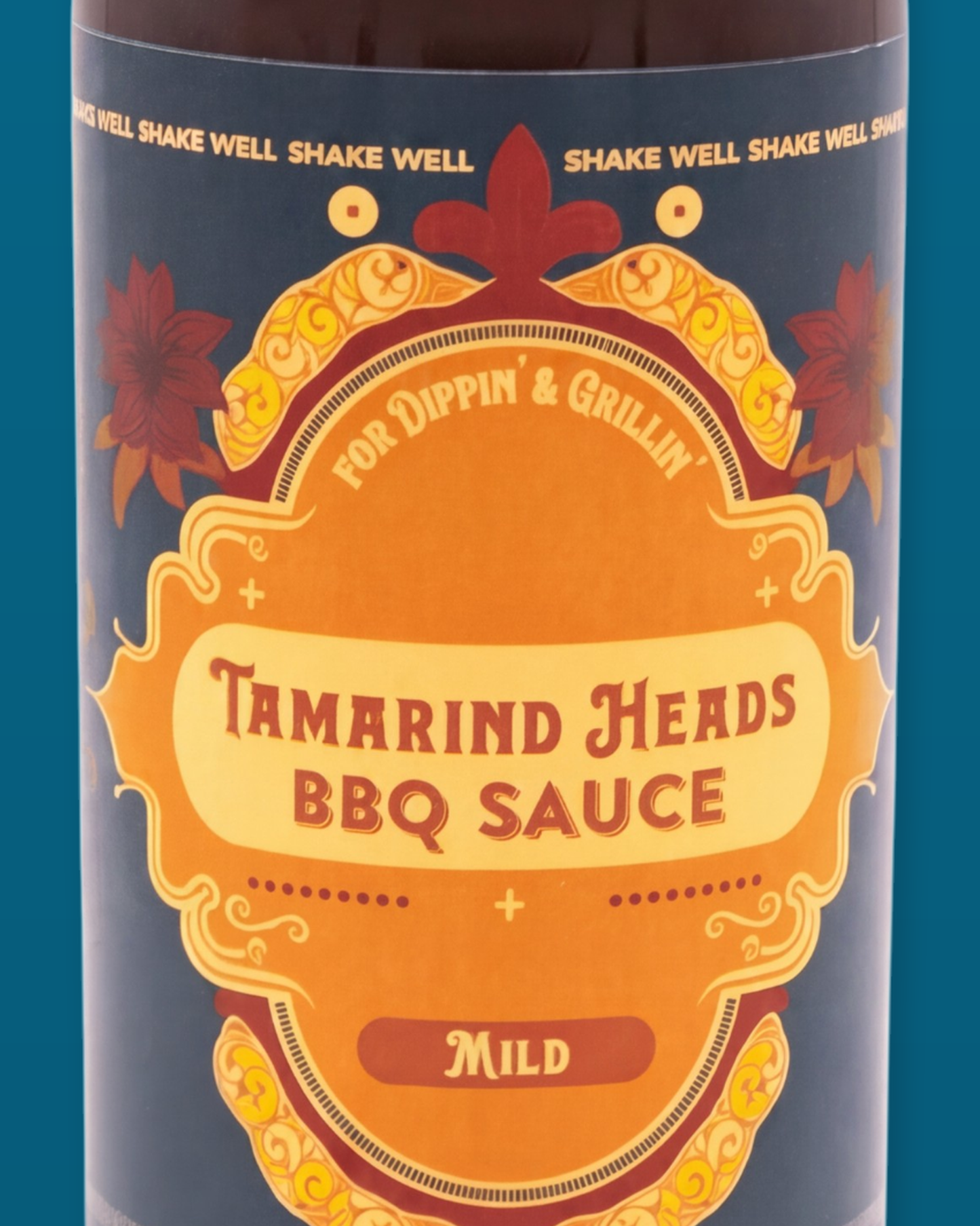 Detail of the Tamarind Heads Spiced Honey Mild BBQ sauce label artwork
