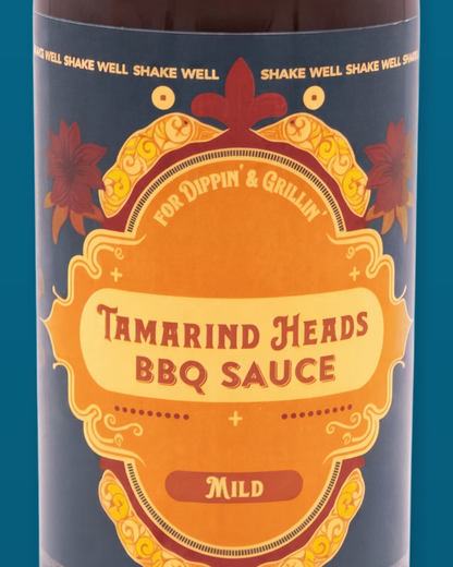 Detail of the Tamarind Heads Spiced Honey Mild BBQ sauce label artwork